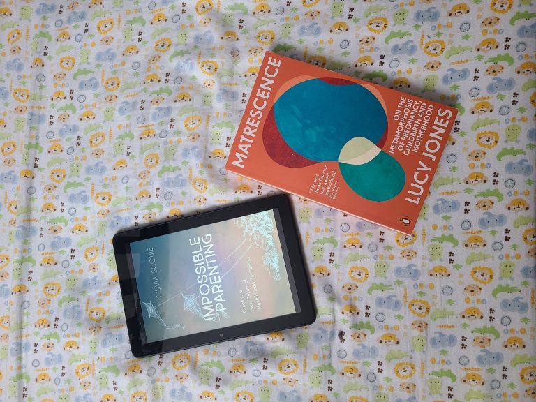 Both books, on a very appropriate piece of fabric.