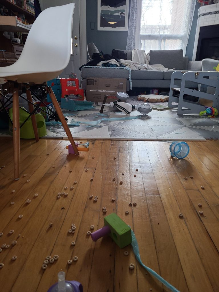 living room littered with cheerios