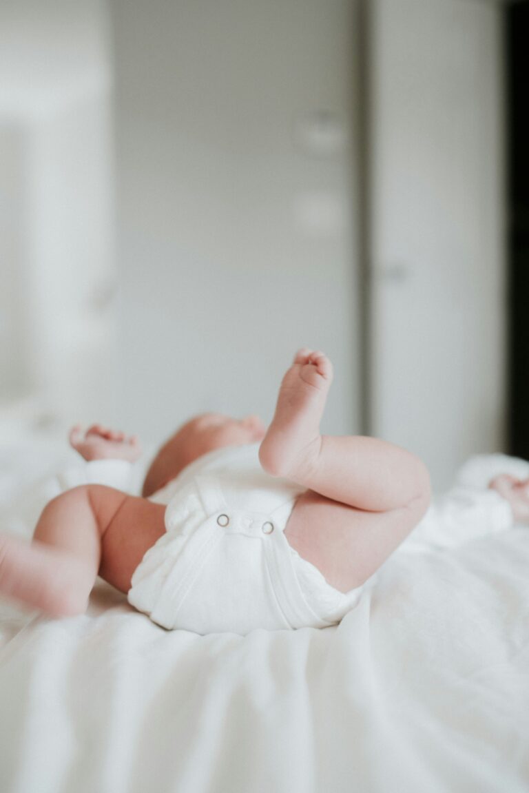 photo of a newborn's feet from below